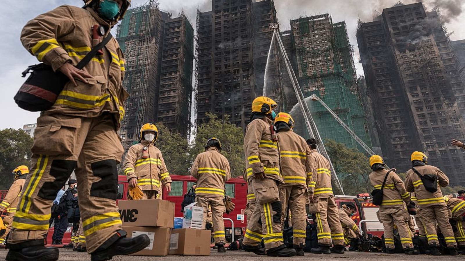 Hong Kong apartment blaze: Police arrest 13 suspects in fire probe as death toll hits 151